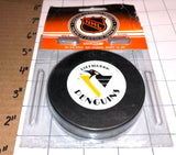1 VINTAGE OFFICIAL LICENSED PITTSBURGH PENGUINS NHL HOCKEY PUCK TRENCH MFG MIP